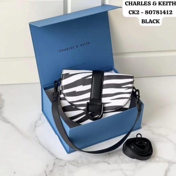Charles & Keith Gabine Saddle Bag Zebra Print (Black)