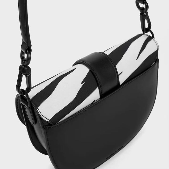 Charles & Keith Gabine Saddle Bag Zebra Print (Black)