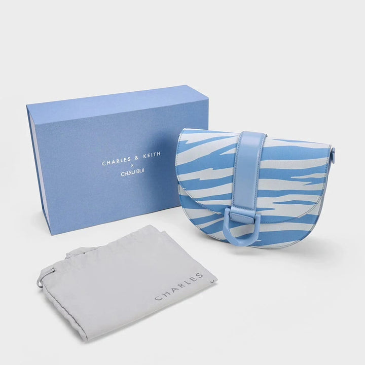Charles & Keith Gabine Saddle Bag Zebra Print (Blue)