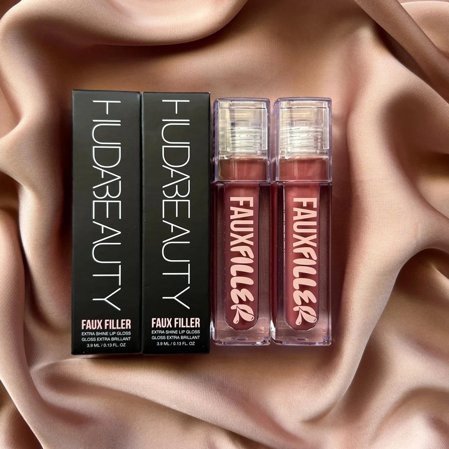 HUDA BEAUTY FAUX FILLER EXTRA SHINE LIP GLOSS